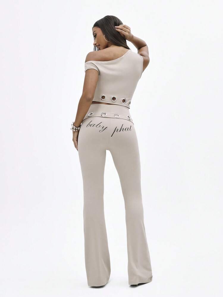BABYPHAT Hoch taillierte Leggings mit Überschlag, Glockenform und Metalleyelets sowie Schriftprint