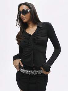BABYPHAT Jersey Button Down Blouse With Mesh Back Detail And Script Graphics For Fall Winter Season