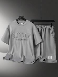 Vacaura 青少年男孩两件套休闲装，时尚立体钢印英文图案圆领套头 T 恤，弧形侧边设计，短裤采用极简纹理饰边和弧形裤腿，适合夏秋季节