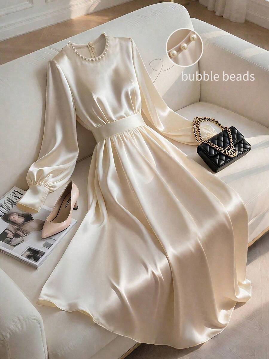 Franclia Váy cổ tròn bằng vải satin thanh lịch có trang trí cổ ngọc trai, thắt eo, tay dài, dài vừa phải, màu trơn, phù hợp cho phụ nữ vào mùa thu - Màu be - Xem 1