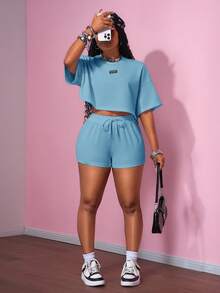 Slaydiva 2025 Bộ đồ thể thao giản dị phong cách đường phố cổ điển đại học 2 nhãn đen trang trí áo thun cổ tròn tay ngắn + quần short siêu ngắn bộ đồ thể thao áo len trắng siêu rộng bộ đồ hai mảnh dành cho nữ - Màu xanh lam - Xem 4