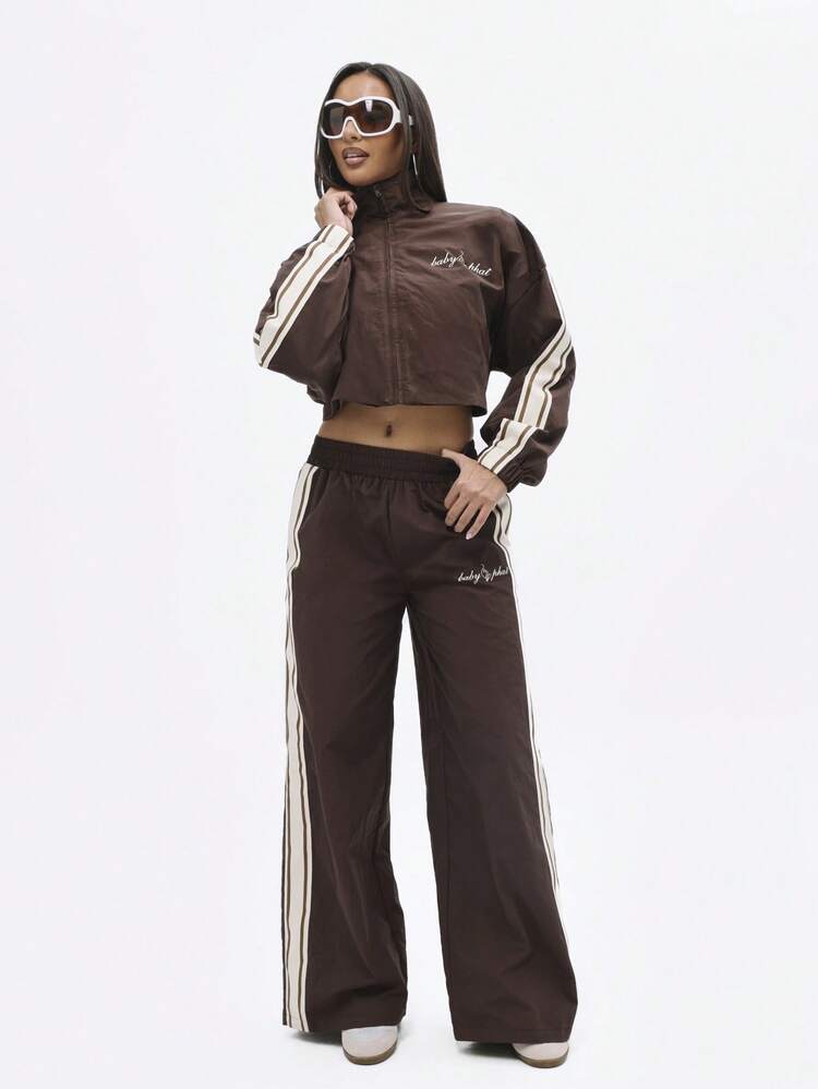 BABYPHAT Nylon Track Jacket With Side Stripe Detail And Zip Closure For Casual Streetwear Style