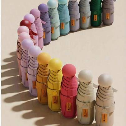 女士胶囊式遮阳伞，二合一迷你五折伞，超轻便携，小巧易携。适合学校、办公室、家庭、旅行和返校季使用。