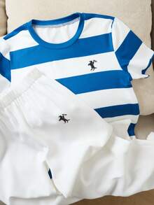 女童经典蓝白条纹短袖T恤+白色宽松长裤套装，清新撞色带来夏日清爽感，T恤上的小装饰增添细节，宽松版型兼顾舒适与休闲，适合日常外出或居家休闲，简约时尚的夏季穿搭之选。 - 藍色 - 查看 1