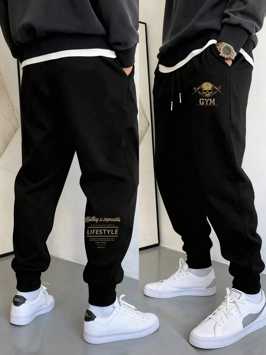 Manfinity Sport Corelite Pantalon de sport pour hommes avec cordon de serrage à la taille, imprimé lettres et crâne, avec poches - Noir - Voir 1