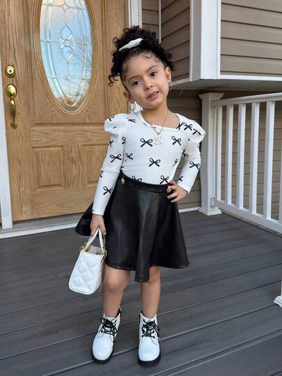 SHEIN 2pcs/Set Young Girl Bow Print Puff Sleeve T-Shirt And PU Metal Button Decor Ruffle Hem Skirt, Autumn/Winter New, Suitable For Young Girls Daily, School, Pair With White Shirt, Back To School, Collegiate Style, Christmas, Girls Winter Outfit, Christmas Outfit, Party Outfit, Daily School Wear, Birthday Outfit, Princess Style, Matching For Mom And Daughter, Sisters