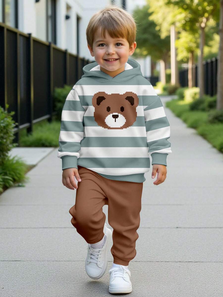 SHEIN Set de 2 sudaderas con capucha de estampado gráfico de ajuste holgado para niños, cómodas y relajadas, aptas para otoño/invierno, con patrón clásico de rayas y oso de píxeles