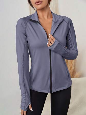 جاكيت رياضي دافئ بجيب مائل وبسحاب بفتحة ابهام