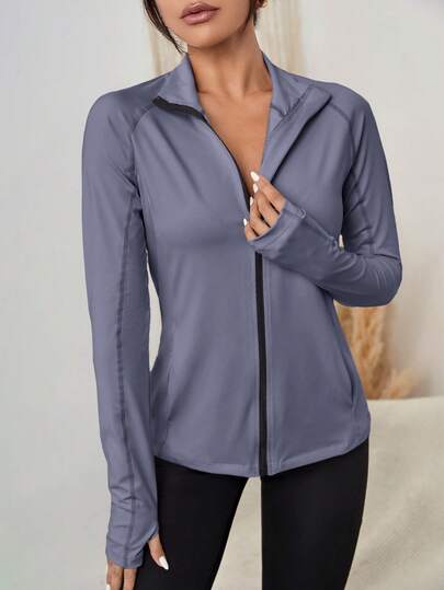 جاكيت رياضي دافئ بجيب مائل وبسحاب بفتحة ابهام