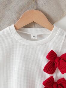 SHEIN Elladie kids Set 2 piese pentru fetițe: Top cu fundă decorativă în textură tip waffle + Fustă plisată roșie, dulce și drăguț, potrivit pentru Anul Nou, sărbători, petreceri, primăvară/toamnă