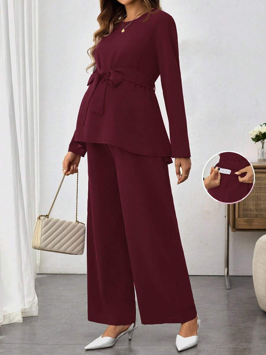 SHEIN 2 piezas Conjunto de maternidad: Camisa de manga larga de cuello redondo de unicolor con diseño de cinturón y pantalones anchos de cintura ajustable, informal - Burdeos - Ver 1