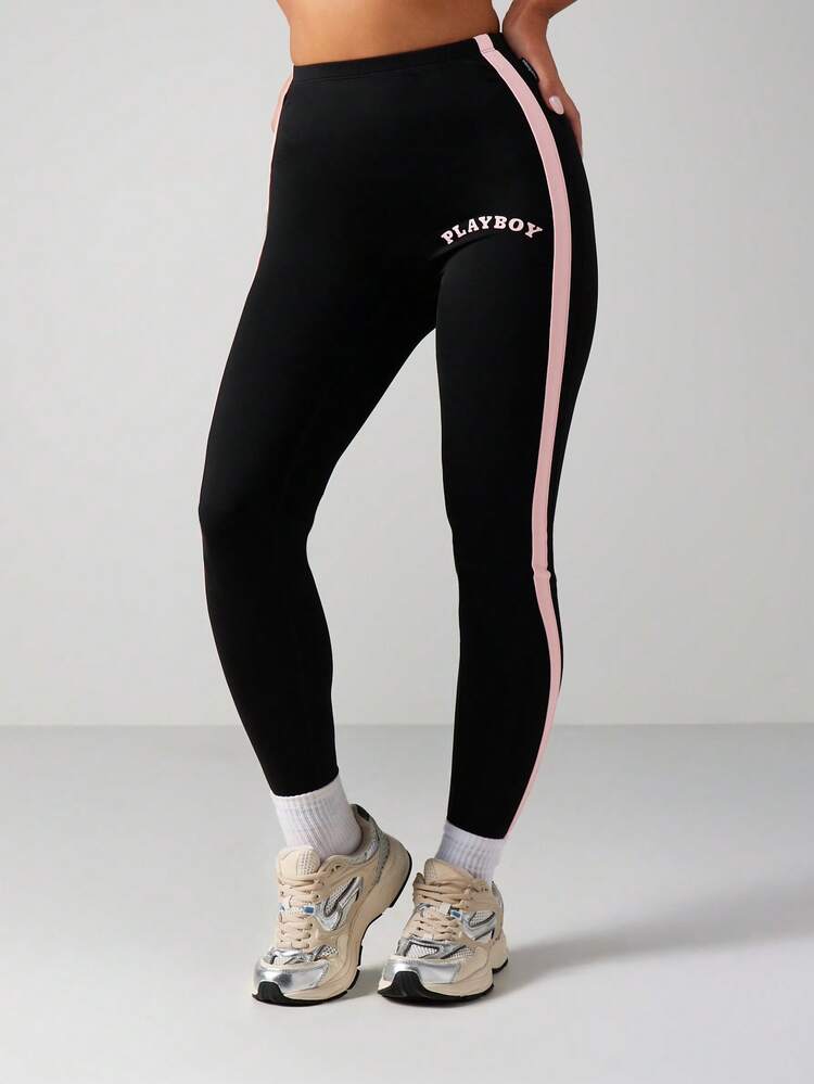 Missguided x Playboy Leggings taille haute avec détail de bande latérale rose et impression de logo pour le vêtement de sport