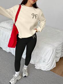 SHEIN EZwear Conjunto informal minimalista de 2 piezas para deportes, calle, fiesta, aeropuerto, con estampado de leopardo y lazo, sudadera holgada de cuello redondo en color amarillo claro y leggings negros ajustados, adecuado para otoño/invierno - Multicolor - Ver 4