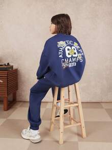 SUMWON 青少年男童运动圆领卫衣和慢跑裤套装，背面印有运动图案和纽约冠军队标志徽章，适合度假穿着。 - 藏蓝色 - 查看 1