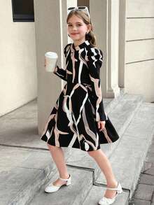 SHEIN 少女优雅经典几何图案立领羊腿长袖A字连衣裙，适合秋冬季节穿着，也适合日常休闲穿着，非常适合休闲、日常穿着、上学穿着，也适合优雅的派对、生日派对、圣诞派对、母女装、姐妹装等场合。 - 黑色 - 查看 10