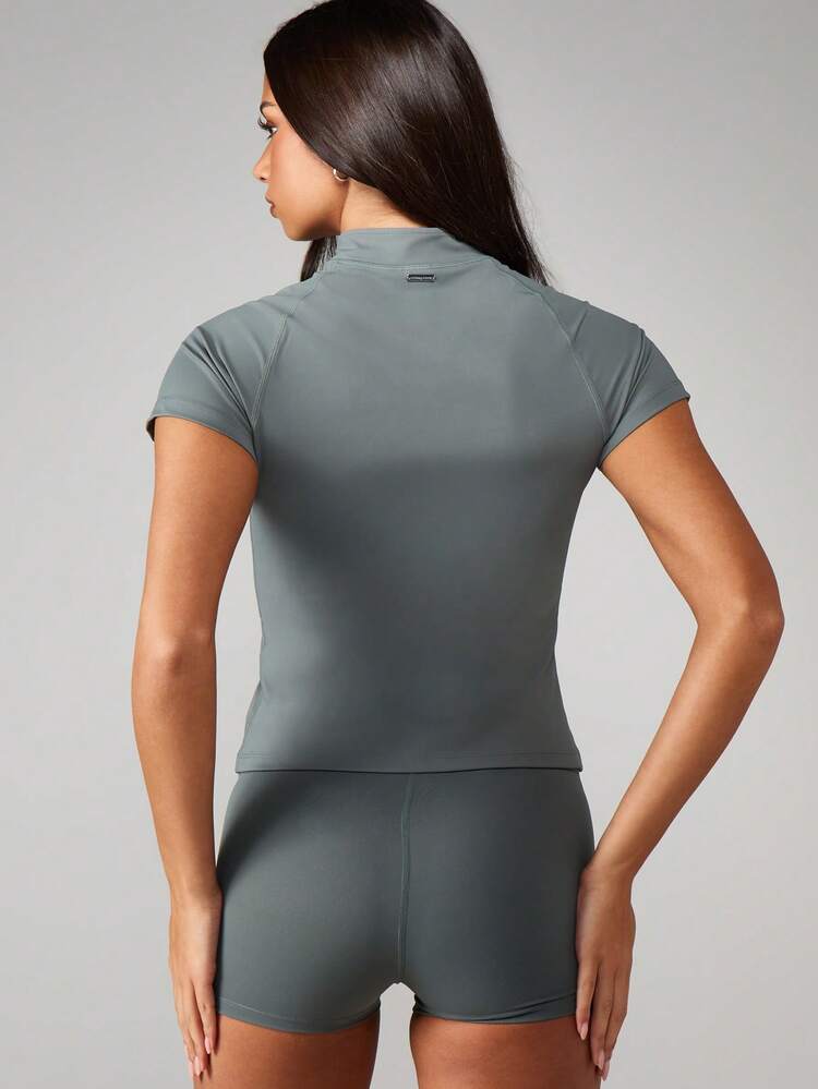 Missguided x Playboy Sage Quarter Zip Polo Shirt With Short Sleeves And Chest Logo