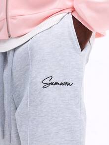 Spodnie dresowe SUMWON z miękkiego polaru z haftowanym logo, o luźnym kroju i ściągaczu w pasie, swobodne, do noszenia w domu, wygodne, zimowe, gładkie - Szary - Zobacz 7