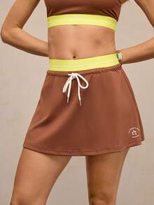 Activina Gonna-pantaloncini sportivi da tennis o golf con vita con coulisse e colori a contrasto - Castano - Visualizzare 3