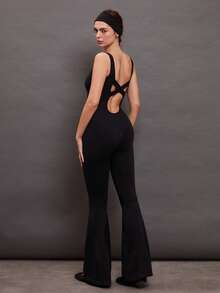 Activina Women's Cross Back Sport Jumpsuit With Open Back - Black - View 1