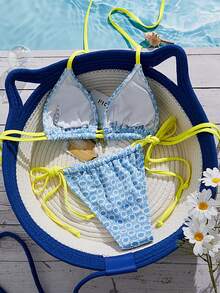 Swim Mod Bộ đồ bơi nữ kiểu dáng hiện đại, ngọt ngào, họa tiết hoa hướng dương phối màu, chất liệu đặc biệt, dây buộc cổ có thể điều chỉnh, quần short buộc dây bên hông. - Nhiều màu - Xem 3