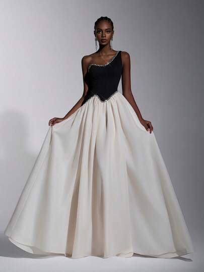 Elitara Elegant, Simple, And Stylish. Black And Apricot Color Blocking, Stretch Knit Organza, Handcrafted Rhinestone Chain Embellishments, Asymmetrical Neckline, Full Skirt With Pleated Train. Suitable For All Formal Occasions, Wedding Guests, And Evening Gowns.