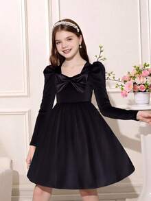 A Single-Piece Black Velvet Dress For Pre-Teen Girls Aged 8-10, Featuring A Retro Style With A Large Bow Detail, Puff Long Sleeves, And A Full Skirt. It Has A Retro And Elegant Style With Luxurious Texture, Suitable For Christmas Outfits, And Is An Exquisite And Elegant Children's Formal Dress For Autumn And Winter. - Black - View 3