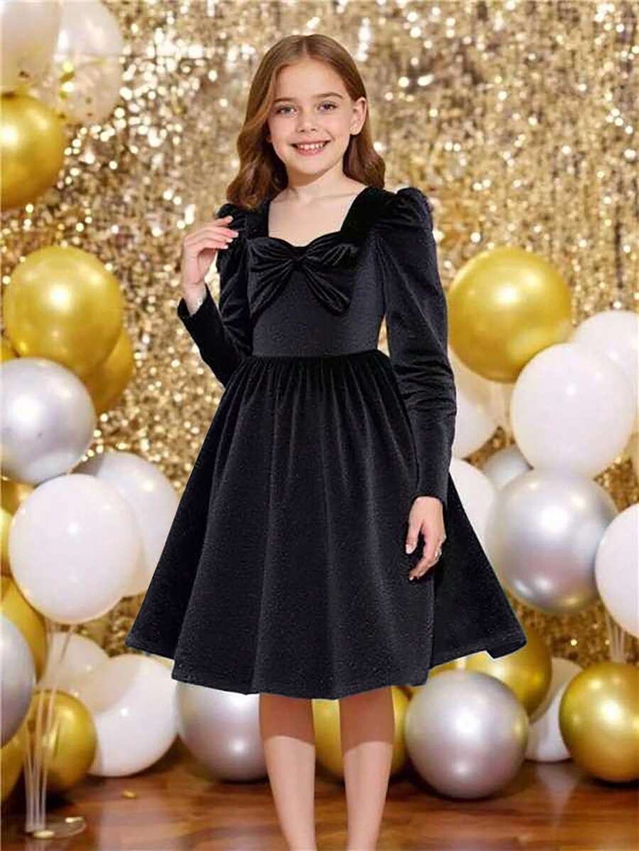 A Single-Piece Black Velvet Dress For Pre-Teen Girls Aged 8-10, Featuring A Retro Style With A Large Bow Detail, Puff Long Sleeves, And A Full Skirt. It Has A Retro And Elegant Style With Luxurious Texture, Suitable For Christmas Outfits, And Is An Exquisite And Elegant Children's Formal Dress For Autumn And Winter. - Black - View 1