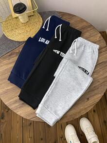 SHEIN 3-częściowy zestaw spodni dresowych dla chłopców z nadrukiem i napisem - Granatowy - Zobacz 6