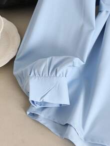 SHEIN 少女纯色前开襟长袖金属装饰休闲衬衫，学院风上衣，返校季 - 淺藍色 - 查看 5