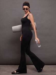 Activina Women's Cross Back Sport Jumpsuit With Open Back - Black - View 5