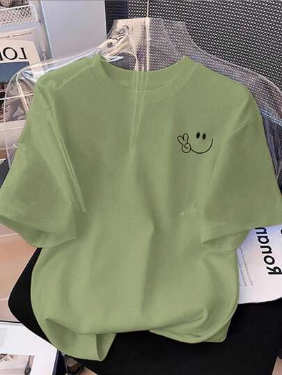 Resyla Camiseta de manga corta casual para mujer con estampado de flores pequeñas y cara sonriente