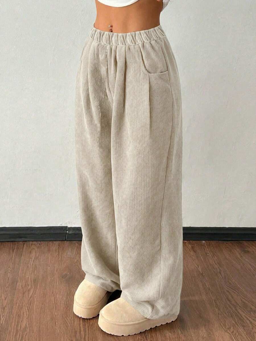 少女灯芯绒宽松休闲裤，厚实百搭，适合日常穿着，杏色