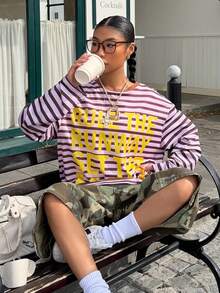 Muchica 这款粉棕色条纹长袖T恤饰有黄色字母印花，为女士秋冬装增添了一抹亮色，是冬季的理想之选。休闲的条纹设计，柔软的针织面料，适合工作日和周末穿着。 - 彩色 - 查看 4