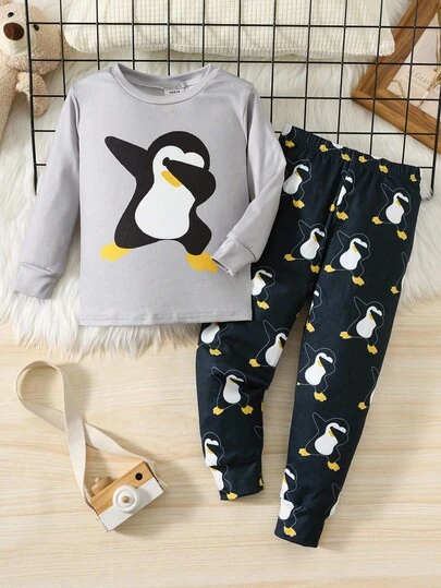 SHEIN 2pcs Kids Boy Casual Comfortable Cartoon Penguin Pattern Crew Neck Long Sleeve Top And Leggings Pajama Set, Black