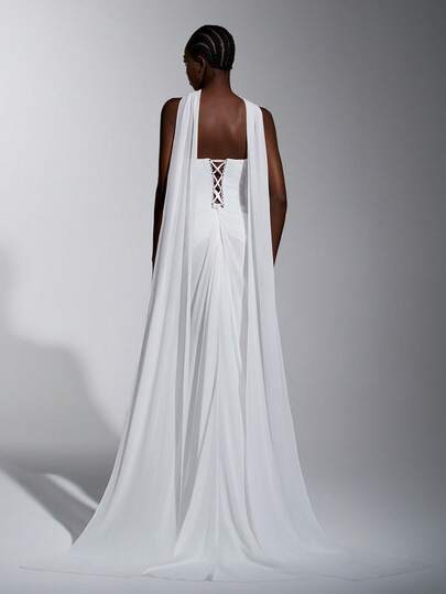 Elitara Đầm chiffon dệt kim co giãn màu trắng thanh lịch và quyến rũ với các chi tiết thêu đắp nổi, đính đá lấp lánh, thân áo cúp ngực, thiết kế 2 trong 1, chân váy đuôi cá xếp ly và đuôi dài. Thích hợp cho đám cưới, váy cô dâu, các dịp trang trọng và những bộ váy cưới được trang trí cầu kỳ.