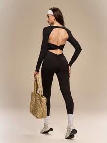 Hanevo Tuta casual da donna a maniche lunghe, elastica, sportiva e sexy, con taglio sulla schiena, adatta per autunno, inverno, primavera ed estate - nero - Visualizzare 5