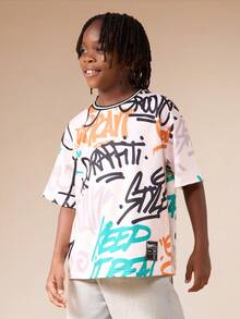 SUMWON Jungen Oversized T-Shirt mit Graffiti-Muster und Urban Street Art Design, Rundhalsausschnitt, Kurzarm, Lässig für den Urlaub - Aprikosenfarben - Übersicht 1