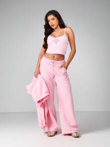 Missguided x Playboy Pantalones de chándal de pierna ancha con gráfico de corazón, cintura con cordón y bolsillos laterales para uso casual y urbano - Rosa - Ver 3