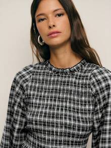 Nöista 两件套格子套装，包括一件长袖衬衫和一条带有荷叶边腰部的配套半身裙，打造优雅正式的廓形，非常适合女性春假穿搭、从办公室到晚宴的无缝过渡、派对的精致造型、生日聚会的女士服装叠穿搭配以及优雅的庆祝活动。 - 黑色 - 查看 2