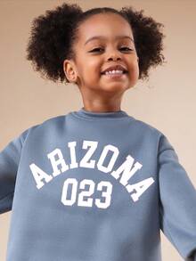SUMWON Arizona 023 大学风印花卫衣搭配紫色格子阔腿喇叭裤，适合秋冬季休闲度假穿着。 - 棕色 - 查看 5