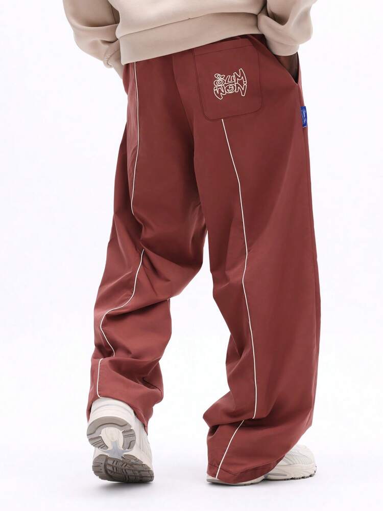 Relaxed Sweatpants With White Piping Detail