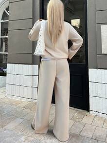 DAZY Bộ đồ 2 món áo trễ vai tay dài khóa kéo phía trước và quần ống rộng dáng rộng thoải mái dành cho nữ - màu nâu - Xem 6