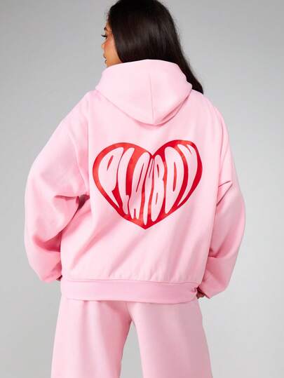 Missguided x Playboy Felpa con cappuccio con stampa a cuore, tasca centrale e cordino, maniche lunghe, casual, comoda e accogliente, adatta per il giorno di San Valentino, colore rosa