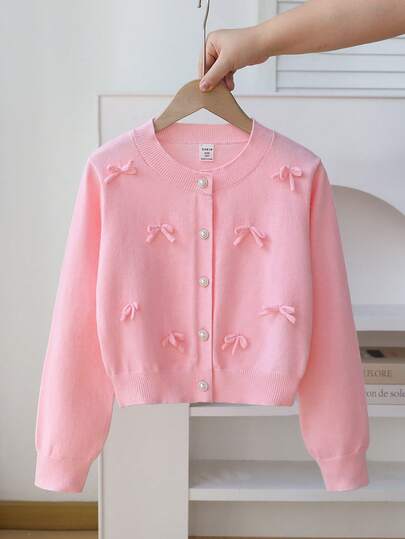 Sparklyn 少女厚针织开衫套装，宽松版型，蝴蝶结装饰，落肩毛衣，柔软舒适，适合休闲、户外、旅行、度假、居家、托儿所等场合穿着。