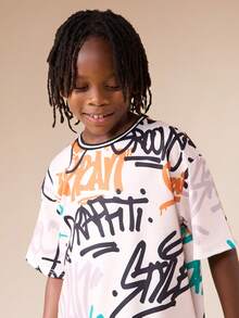 SUMWON Jungen Oversized T-Shirt mit Graffiti-Muster und Urban Street Art Design, Rundhalsausschnitt, Kurzarm, Lässig für den Urlaub - Aprikosenfarben - Übersicht 3