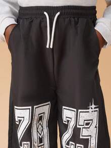 SUMWON Boys Grunge Style Wide Leg Pants With Flame Print And Varsity Numeric Graphics For Casual School Wear Vacation - Black - View 6