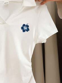 SHEIN Leap Crew قميص قصير بياقة بولو وأكمام قصيرة مطوية جانبيًا، مناسب للفتيات المراهقات، بطبعة أوركيد كلاسيكية - أبيض - مشاهدة 4