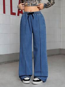 SHEIN Jeans rectos de mezclilla negra con parches para adolescentes, moda casual de campus recomendada para otoño/invierno. Tela negra clásica y cómoda, con panel frontal de parches, cintura elástica con cordón, fácil de poner y quitar, silueta recta holgada que estiliza las piernas, adecuado para diversos tipos de Body. Versátil y resistente a la suciedad, perfecto para salidas, ocio en el campus o uso diario, creando un aspecto juvenil y enérgico. - Azul lavado oscuro - Ver 5
