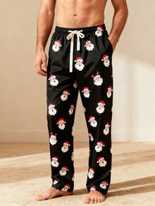 Manfinity Homme Quần đi biển ống đứng rộng rãi họa tiết Giáng sinh có dây rút eo dành cho nam - màu đen - Xem 6