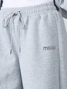 MISSGUIDED 舒适阔腿慢跑裤，配有抽绳腰带和侧袋，适合休闲居家穿着和日常穿着。 - 灰色 - 查看 4